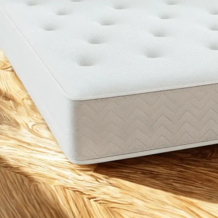 Alt Tag: Denton Mattress close-up showing quilted top and supportive side panel for orthopaedic comfort and spinal alignment